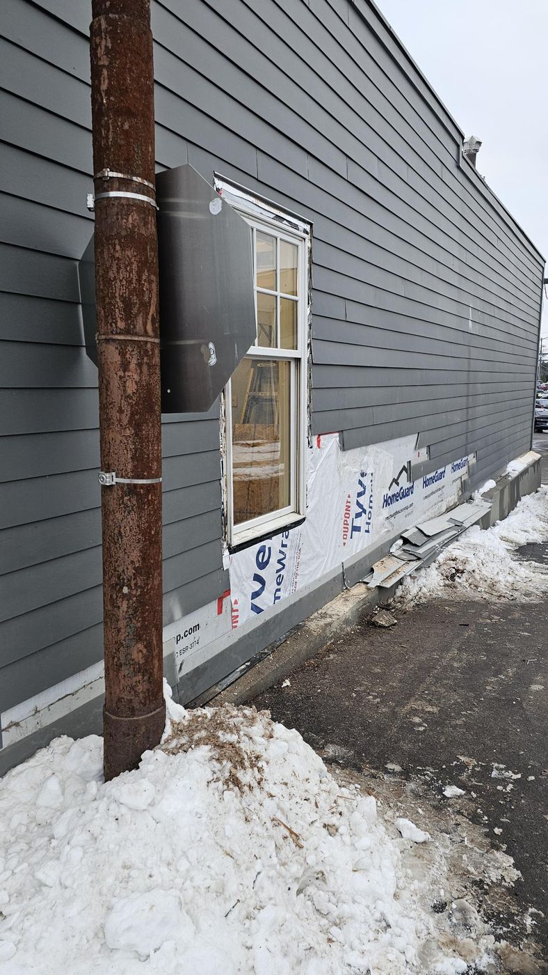 New sheathing, house wrap and window reset