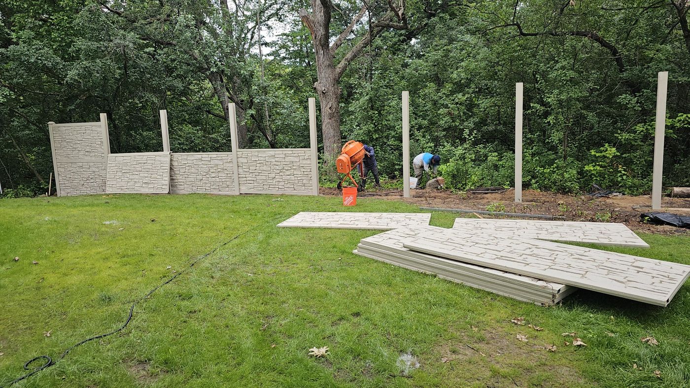 Simulated-stone panels going in