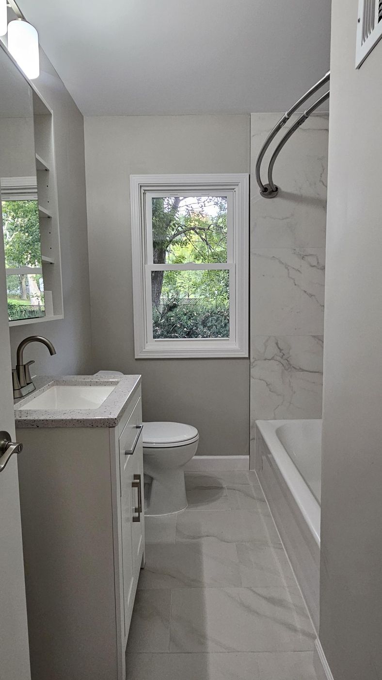 Finished bath: vanity, tile and new window