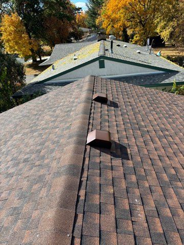 Finished roof with new flashing and vents