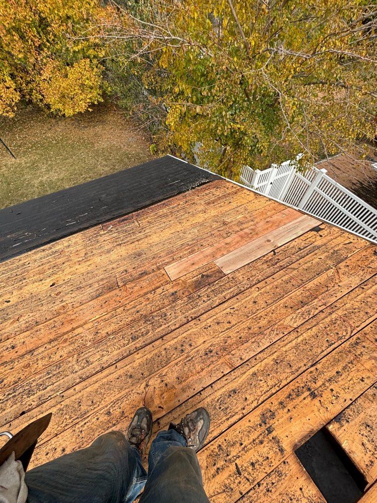 Tear-off down to the decking, rotted boards replaced