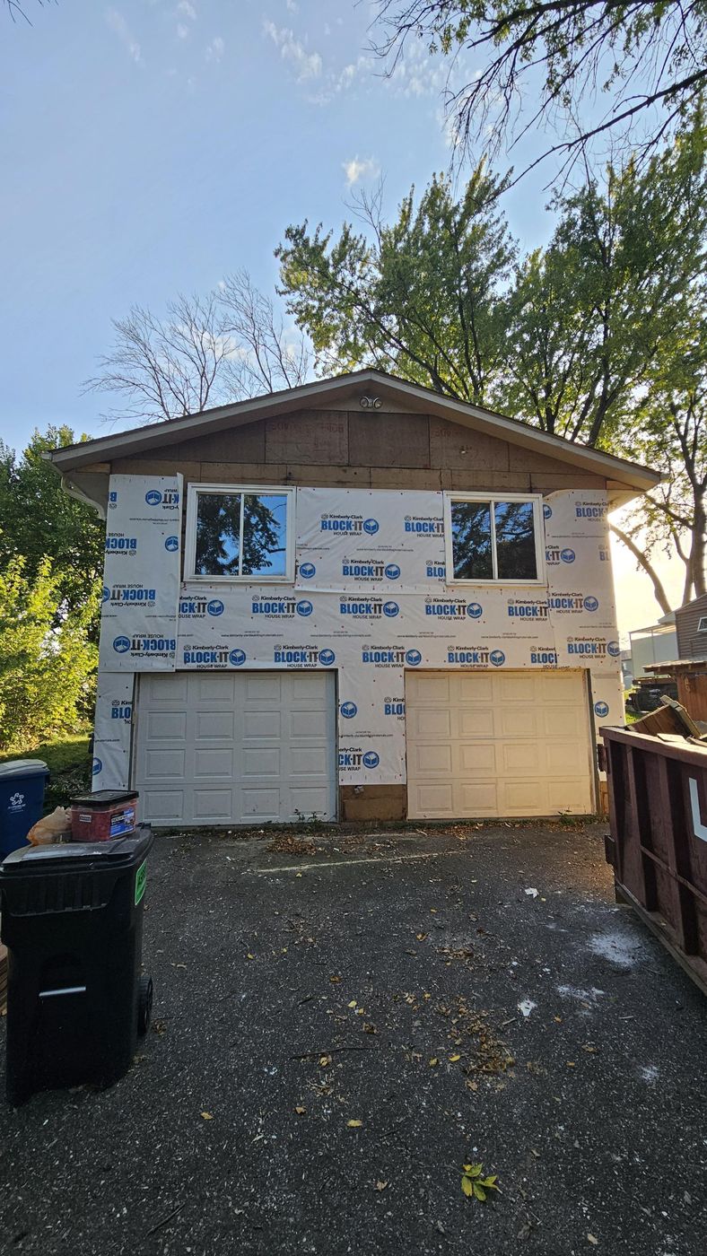 Before: full siding tear-off and house wrap