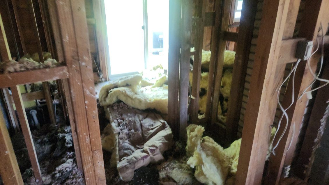 Water-damaged insulation removed